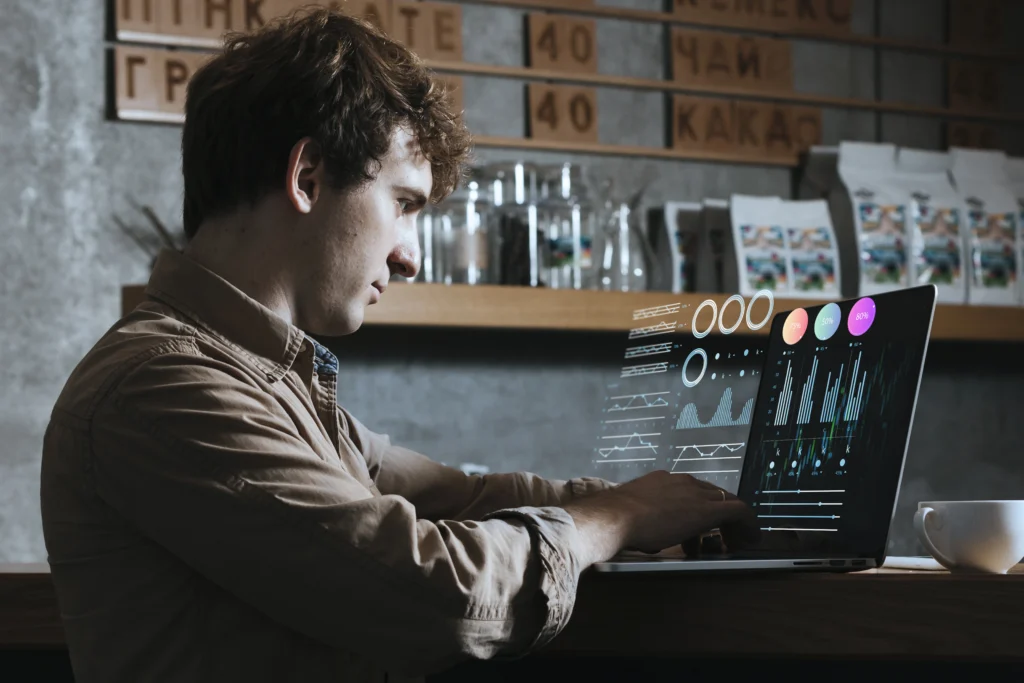 Designer reviewing UI dashboards and data visualizations