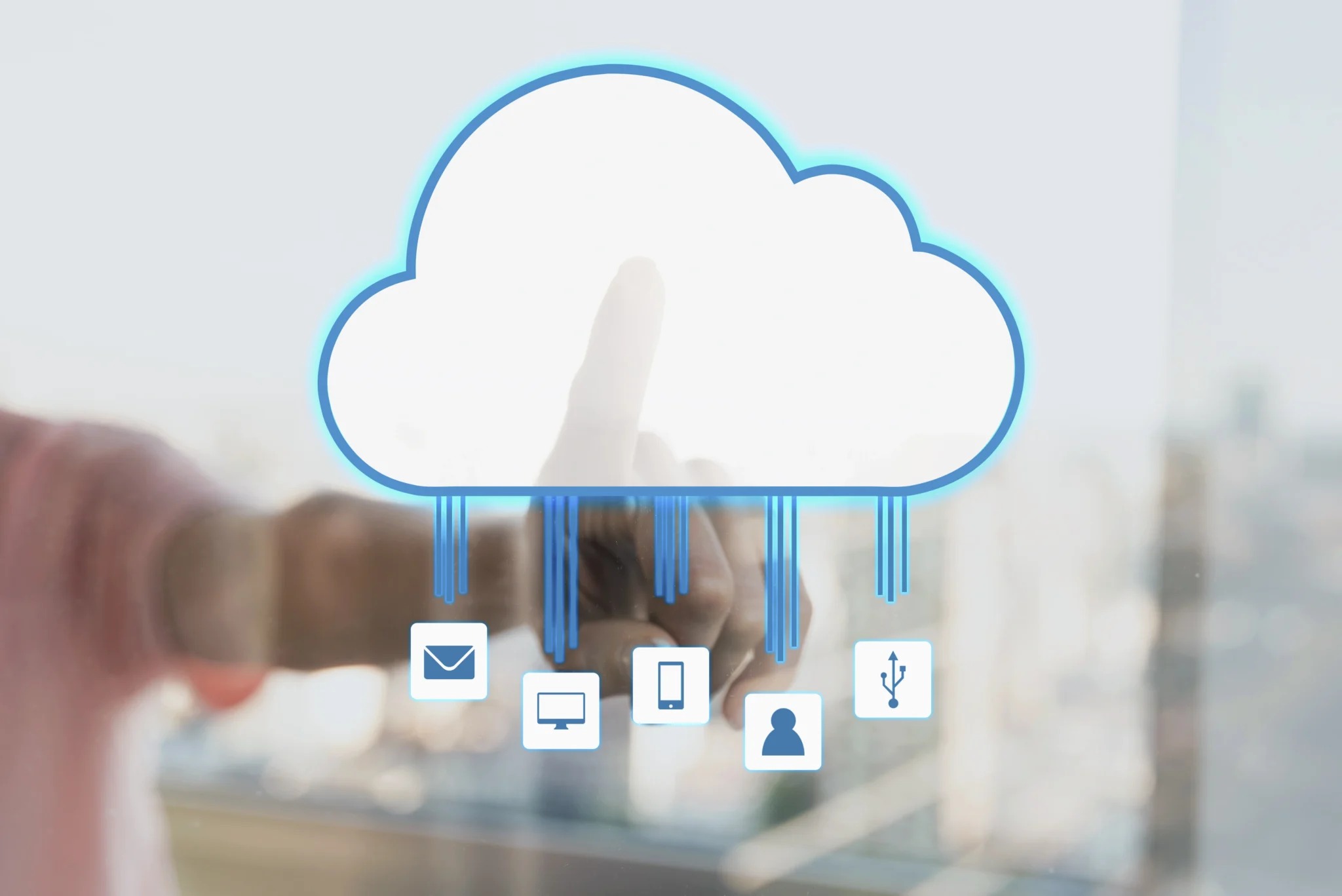 Hand touching a cloud icon connected to devices, representing cloud management